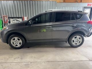 2015 Toyota RAV4 LE - Exterior Side Driver Image